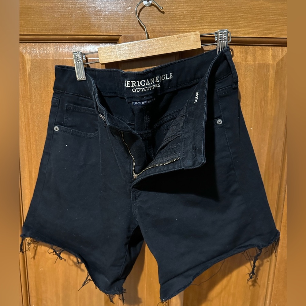 Womens black midi ripped shorts